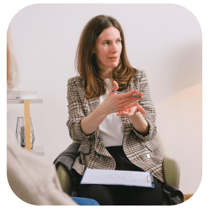 A professional who guides clients in reflecting, clarifying goals, and navigating life changes.